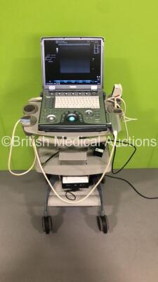 GE Logiq e Portable Ultrasound Scanner Ref 5199704 Software Version R5.0.1 BT Version 07 with 2 x Transducers/Probes (1 x 12LRS * Mfd Jan 2008 * and 1 x i12L-RS * Mfd Sept 2007 *) on GE Mobile Cart (Powers Up-See Photos for Air Scans) * SN 82038WX1 * * Mf