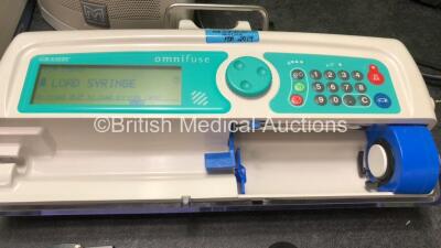 Mixed Lot Including 1 x Graseby Omnifuse Syringe Pump (Powers Up) 3 x Serres Cups, 1 x Laerdal FST1915 Unit (No Power) 1 x Welch Allyn Suretemp Plus Thermometer (No Power) 1 x Graseby MR10 Neonatal Respiration Monitor (No Power) 1 x Masimo Set Visi Black - 4