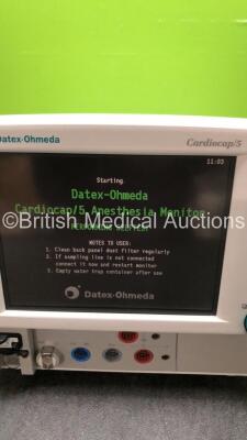 Datex Ohmeda Cardiocap 5 Anesthesia Monitor Including Spirometry, ECG, NIBP, SpO2, P1, P2, T1, T2 and Gas Options with D-fend Water Trap (Powers Up with Slight Damage on Casing-See Photo) *SNFBWF02338* - 2