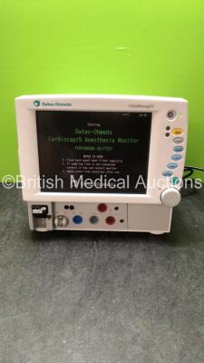 Datex Ohmeda Cardiocap 5 Anesthesia Monitor Including Spirometry, ECG, NIBP, SpO2, P1, P2, T1, T2 and Gas Options with D-fend Water Trap (Powers Up with Damaged Power Button-See Photo) *SN FBWG00689*