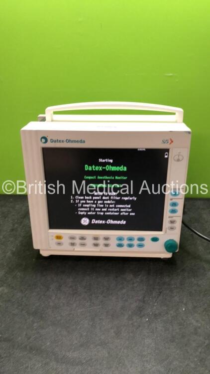 Datex Ohmeda S/5 Compact Anesthesia Monitor with 1 x Datex Ohmeda M-NESTPR Module Including ECG, SpO2, NIBP, T1, T2, P1, P2 Options, 1 x Datex Ohmeda M-P-00-03 P3 Module (Powers Up) *SN 5218168*