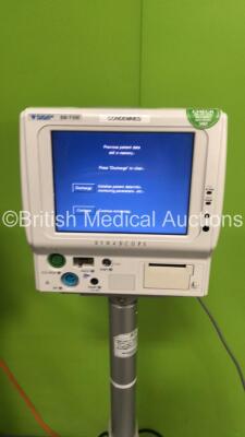 3 x Fukuda Denshi DS-7100 Patient Monitors on Stands with ECG/Resp, SPO2, NIBP, BP and Temp Options (All Power Up - 1 x Missing Printer Cover and All Units have Damage - See Pictures) - 7