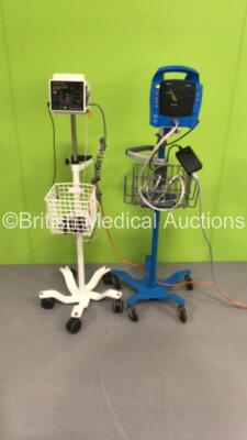 1 x CSI Criticare 506DXN SPO2/Comfortcuff Vital Signs Monitor on Stand and 1 x GE Dinamap ProCare Auscultatory 100 Vital Signs Monitor on Stand with BP Hose (Both No Power - 1 x Damage to Case)