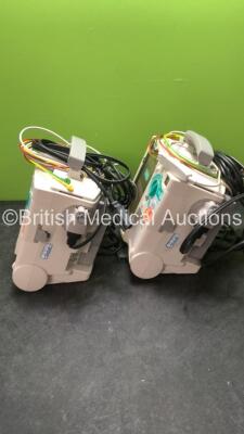 2 x Philips MRx Defibrillators Including ECG and Printer Options with 2 x Philips M3539A Power Adapters 2 x Paddle Lead, and 2 x 3 Lead ECG Leads (Both Power Up) *US00546549, US0054659* - 4