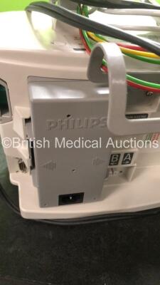 2 x Philips MRx Defibrillators Including ECG and Printer Options with 2 x Philips M3539A Power Adapters 2 x Paddle Lead, and 2 x 3 Lead ECG Leads (Both Power Up) *US00546541, US00546547* - 5