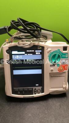 2 x Philips MRx Defibrillators Including ECG and Printer Options with 2 x Philips M3539A Power Adapters 2 x Paddle Lead, and 2 x 3 Lead ECG Leads (Both Power Up) *US00546550, US00546545* - 3