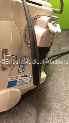 2 x Philips MRx Defibrillators Including ECG and Printer Options with 2 x Philips M3539A Power Adapters 2 x Paddle Lead, and 2 x 3 Lead ECG Leads (Both Power Up) *US00546550, US00546545* - 4