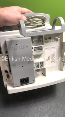 2 x Philips MRx Defibrillators Including ECG and Printer Options with 2 x Philips M3539A Power Adapters 2 x Paddle Lead, and 2 x 3 Lead ECG Leads (Both Power Up) *US00546550, US00546545* - 6