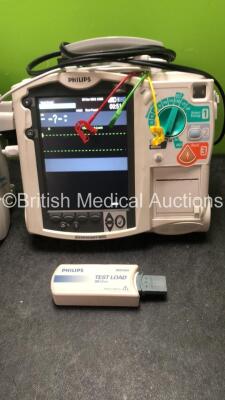 2 x Philips MRx Defibrillators Including Pacer,ECG and Printer Options with 2 x Philips M3539A Power Adapters, 2 x Philips M3538A Batteries, 2 x Paddle Lead, 2 x Philips M3725A Test Loads and 2 x 3 Lead ECG Leads (Both Power Up) *US00585183, US00546520* - 2