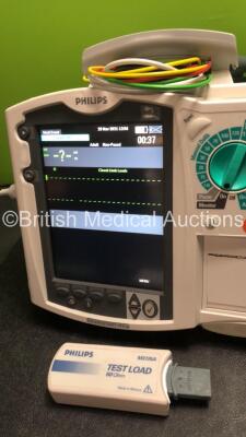 2 x Philips MRx Defibrillators Including Pacer,ECG and Printer Options with 2 x Philips M3539A Power Adapters, 2 x Philips M3538A Batteries, 2 x Paddle Lead, 2 x Philips M3725A Test Loads and 2 x 3 Lead ECG Leads (Both Power Up) *US00585183, US00546520* - 5