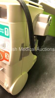 2 x Philips MRx Defibrillators Including Pacer, ECG SpO2 and Printer Options with 2 x Philips M3539A Power Adapters, 2 x Philips M3538A Batteries, 2 x Paddle Lead, and 2 x 3 Lead ECG Leads (Both Power Up) *US00539106, US00546526* - 10