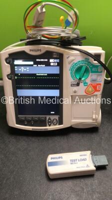 2 x Philips MRx Defibrillators Including Pacer, ECG and Printer Options with 2 x Philips M3539A Power Adapters, 2 x Philips M3538A Batteries, 2 x Paddle Lead, and 2 x 3 Lead ECG Leads (Both Power Up) *US00554890, US00546521* - 3