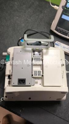 2 x Philips MRx Defibrillators Including Pacer, ECG and Printer Options with 2 x Philips M3539A Power Adapters, 2 x Philips M3538A Batteries, 2 x Paddle Lead, and 2 x 3 Lead ECG Leads (Both Power Up) *US00554890, US00546521* - 7