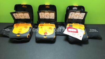 3 x Medtronic Lifepak CR Plus Defibrillators with 3 x Ambu Res-Cue Masks in Carry Cases (All Power Up) *35748954 - 38948543 - 35309741*