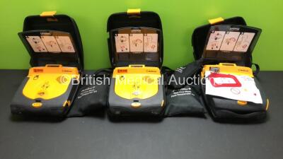 3 x Medtronic Lifepak CR Plus Defibrillators with 3 x Ambu Res-Cue Masks in Carry Cases (All Power Up) *35749032 - 35748993 - 38710707*