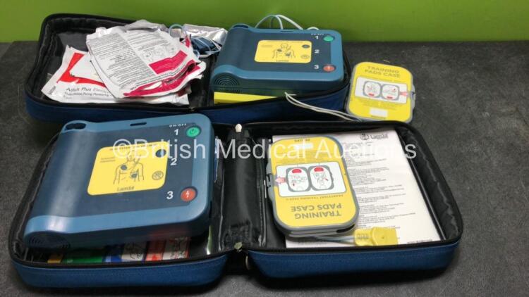 2 x Heartstart FRx Trainer Defibrillators in Carrt Cases *SN 2574201, 588512*