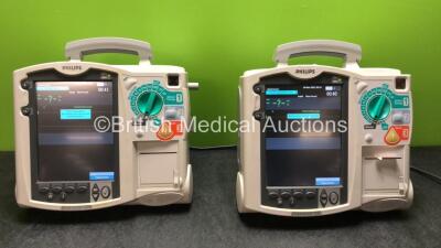 1 x Philips Heartstart MRx Defibrillator Including ECG and Printer Options, 1 x Philips Heartstart MRx Defibrillator Including Pacer, ECG and Printer Options with 2 x Philips M3539A Power Adapter and 2 x Philips M3538A Batteries (Both Power Up with Devic