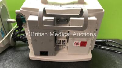 2 x Philips MRx Defibrillators Including Pacer, ECG and Printer Options with 2 x Philips M3539A Power Adapters and 2 x Philips M3538A Batteries, 2 x Paddle Lead, 2 x Philips M3725A Test Loads and 1 x 3 Lead ECG Lead (Both Power Up 1 with Device Error-See - 5