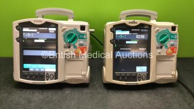2 x Philips MRx Defibrillators Including Pacer, ECG and Printer Options (Both Power Up when Tested with Stock Batteries-Batteries Not Included)
