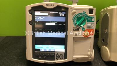 2 x Philips MRx Defibrillators Including Pacer, ECG and Printer Options (Both Power Up when Tested with Stock Batteries-Batteries Not Included) - 2