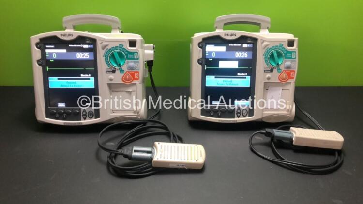 2 x Philips MRx Defibrillators Including Pacer, ECG and Printer Options with 1 x Battery (Both Power Up when Tested with Stock Batteries-Batteries Not Included)