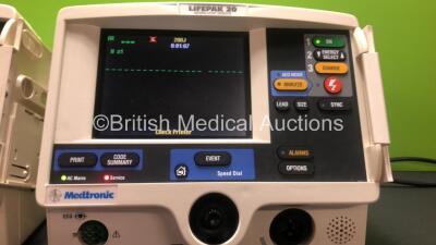 2 x Lifepak 20 Defibrillator / Monitors *Mfd 2004 - 2004* Including ECG and Printer Options (Both Power Up with Service Lights) *GI* - 2