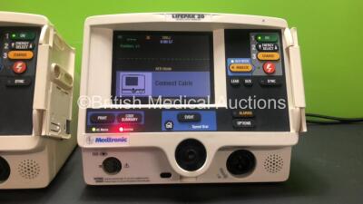 2 x Lifepak 20 Defibrillators / Monitors *Mfd 2006 - 2004* Including ECG and Printer Options (Both Power Up with Service Lights) *GI* - 2