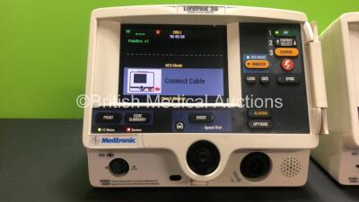 2 x Lifepak 20 Defibrillators / Monitors *Mfd 2006 - 2004* Including ECG and Printer Options (Both Power Up with Service Lights) *GI* - 3