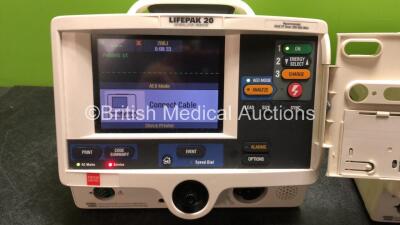 2 x Lifepak 20 Defibrillators / Monitors *Mfd 2004 - 2005* Including ECG and Printer Options (Both Power Up with Service Lights) *GI* - 2