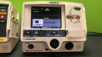 2 x Lifepak 20 Defibrillators / Monitors *Mfd 2006 - 2006* Including ECG and Printer Options (Both Power Up with Service Lights) *GI* - 2