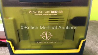 Job Lot Including 1 x Forerunner Heartstream Semi Automatic Defibrillator with 1 x Battery in Carry Bag (Untested Due to Possible Flat Battery) 1 x Cardiac Science Powerheart AED G3 Automated External Defibrillator (Powers Up when tested with stock batter - 3