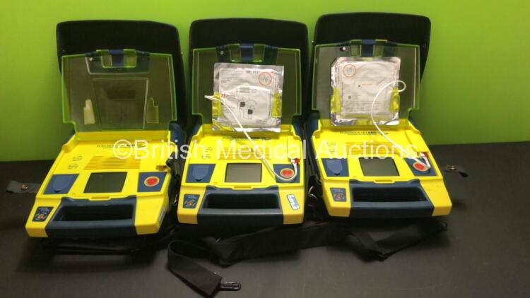 3 x Cardiac Science PowerHeart AED G3 Pro Defibrillators with 3 x Carry Cases (All Power Up with Stock Battery-Batteries Not Included)