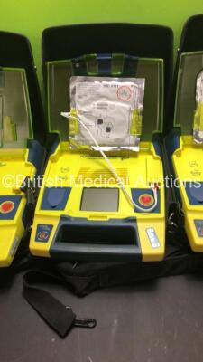 3 x Cardiac Science PowerHeart AED G3 Pro Defibrillators with 3 x Carry Cases (All Power Up with Stock Battery-Batteries Not Included) - 3