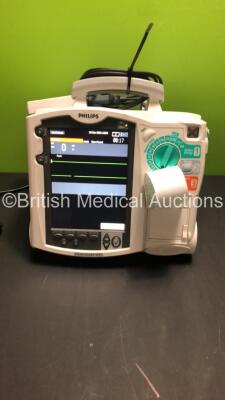Philips HeartStart MRX Defibrillator with ECG and Printer Options,1 x Battery,1 x Philips M3539A Module,1 x Paddle Lead and 1 x Philips M32725A Test Load (Powers Up)