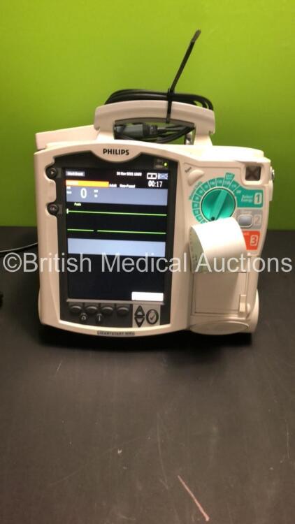 Philips HeartStart MRX Defibrillator with ECG and Printer Options,1 x Battery,1 x Philips M3539A Module,1 x Paddle Lead and 1 x Philips M32725A Test Load (Powers Up)