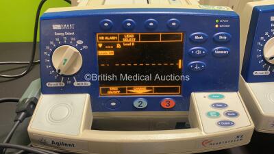Job Lot Including 3 x Agilent Heartstream XL Smart Biphasic Defibrillators with Pacer, ECG and Printer Options, 3 x 3 Lead ECG Leads, 3 x Paddle Leads, 3 x Test Loads and 3 x Batteries and 1 x Philips Heartstart XL Smart Biphasic Defibrillator with Pacer, - 6