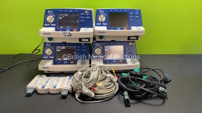 4 x Philips Heartstart XL Smart Biphasic Defibrillators with Pacer, Printer and ECG Options, 4 x Test Loads, 4 x 3 Lead ECG Leads, 4 x Paddle Leads and 4 x Batteries (3 x Power Up) *US00595659 / US00448299 / US00448300 / US00595660*