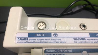 4 x Philips Heartstart XL Smart Biphasic Defibrillators with ECG and Printer Options, 4 x Test Loads, 4 x Paddle Leads, 4 x 3 Lead ECG Leads and 4 x Batteries (All Power Up) *US00122134 / US00448295 / US00116839 / US00588708* - 7