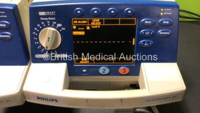 4 x Philips Heartstart XL Smart Biphasic Defibrillators with ECG and Printer Options, 4 x Test Loads, 4 x Paddle Leads, 4 x 3 Lead ECG Leads and 4 x Batteries (3 x Power Up) *US00234732 - USUS00595663 - US00448294 - US00452790* - 5