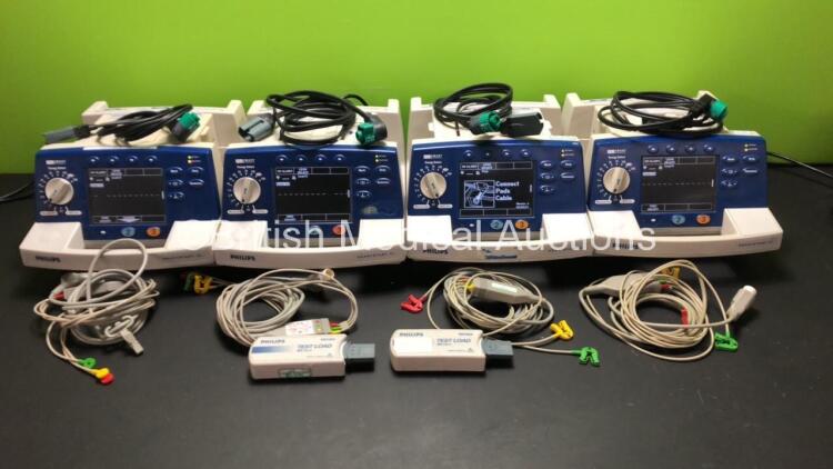 4 x Philips Heartstart XL Smart Biphasic Defibrillators with ECG and Printer Options, 2 x Test Loads, 4 x Paddle Leads, 4 x 3 Lead ECG Leads and 4 x Batteries (All Power Up with 1 x Casing Damage) *US00448296 - US00452789 - US00452785 - US00448297*
