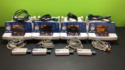 4 x Agilent Heartstream XL Smart Biphasic Defibrillators with ECG and Printer Options, 4 x Test Loads, 4 x Paddle Leads, 4 x 3 Lead ECG Leads and 4 x Batteries (All Powewr Up) *US00103775 - US00110040 - US00110041 - US00110042*