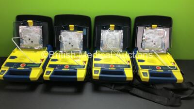 4 x Cardiac Science Powerheart AED G3 Automated External Defibrillators with 4 x Batteries and 4 x Carry Cases (All Power Up with 1 x Service Required)