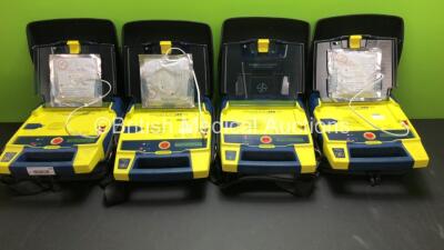4 x Cardiac Science Powerheart AED G3 Automated External Defibrillators with 4 x Batteries and 4 x Carry Cases (All Power Up)