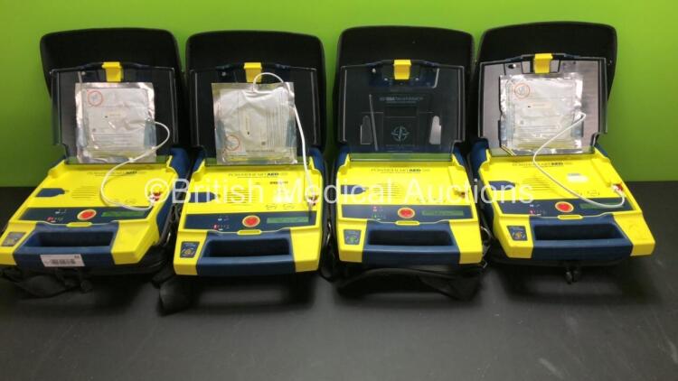 4 x Cardiac Science Powerheart AED G3 Automated External Defibrillators with 4 x Batteries and 4 x Carry Cases (All Power Up)