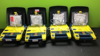 4 x Cardiac Science Powerheart AED G3 Automated External Defibrillators with 4 x Batteries and 4 x Carry Cases (All Power Up)