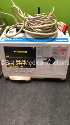 2 x Zoll M Series Biphasic Defibrillators Including ECG and Printer Options with 2 x Batteries, 2 x Patch Cables and 2 x 3 Lead ECG Leads (Both Power Up) *SN TZ7I94297, T06K85376* - 3