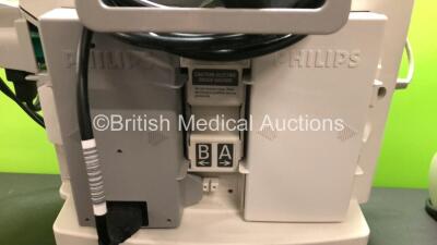 2 x Philips MRx Defibrillators Including ECG and Printer Options with 2 x Philips M3539A Power Adapters and 2 x Philips M3538A Batteries 2 x Paddle Lead, 2 x Philips M3725A Test Loads and 2 x 3 Lead ECG Leads (Both Power Up) *US00546551 - US00546543* - 5