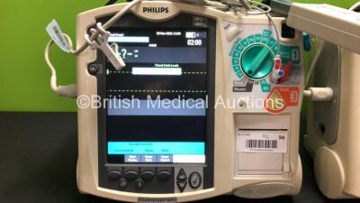 2 x Philips MRx Defibrillators Including Pacer, ECG and Printer Options with 2 x Philips M3539A Power Adapters and 2 x Philips M3538A Batteries 2 x Paddle Lead, 2 x Philips M3725A Test Loads and 2 x 3 Lead ECG Leads (Both Power Up) *US00546528 - US0031518 - 3