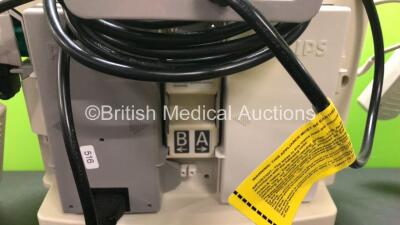 2 x Philips MRx Defibrillators Including Pacer, ECG and Printer Options with 2 x Philips M3539A Power Adapters and 2 x Philips M3538A Batteries 2 x Paddle Lead, 2 x Philips M3725A Test Loads and 2 x 3 Lead ECG Leads (Both Power Up) *US00546528 - US0031518 - 6