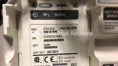 2 x Philips MRx Defibrillators Including Pacer, ECG and Printer Options with 2 x Philips M3539A Power Adapters and 2 x Philips M3538A Batteries 2 x Paddle Lead, 2 x Philips M3725A Test Loads and 2 x 3 Lead ECG Leads (Both Power Up) *US00546528 - US0031518 - 7